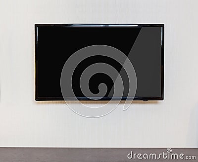 Modern living room with TV on the wall. Stock Photo