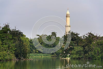 Minaret lookout tower behind castle pond in Lednice Valtice area Stock Photo