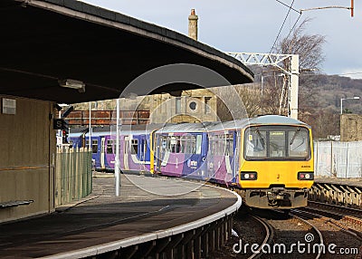 Leeds train leaving Carnforth station platform 2 Editorial Stock Photo
