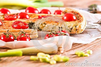 Leek and tomato quiche. Stock Photo