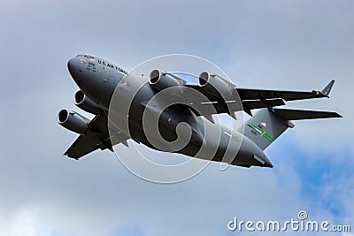 LEEUWARDEN, THE NETHERLANDS - MAY 5, 2015: US Air Force Boeing C-17 Globemaster III transport plane taking off from Leeuwarden Editorial Stock Photo