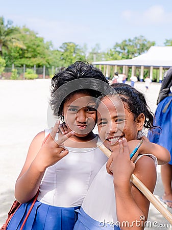 Lefaga, Upolu, Samoa - August 2, 2018: Primary school girls with Editorial Stock Photo