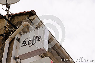 Leffe Belgian beer sign brand and text logo on wall bar restaurant pub Editorial Stock Photo