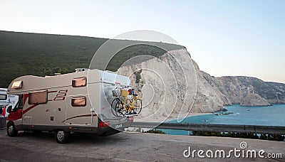 Lefkada, Greece, 16 July 2018, A camper parked to enjoy the view from above of the beach and the sea of Porto Katsiki Editorial Stock Photo
