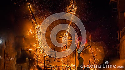 Burning falla sculpture during Las Fallas in Valencia Spain Editorial Stock Photo