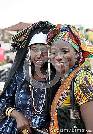 Left: just-married Fula, right: wolof (tribe) women, Gambia Editorial Stock Photo