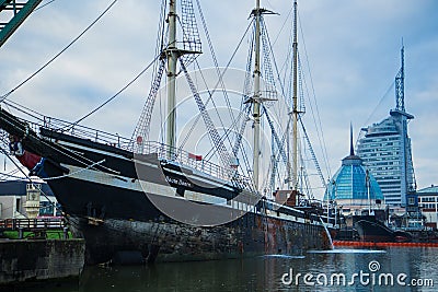 Left side (backboard) of the damaged sailing ship Deuten Deern at the marine museum. Editorial Stock Photo