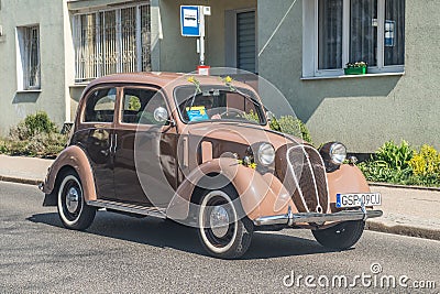 Vintage Italian brown Fiat 1500 driving Editorial Stock Photo