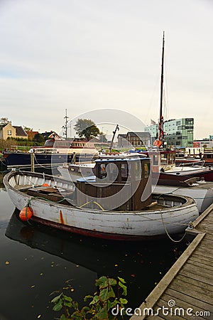 Old wooden Danish boat in Nakskov, Denmark Editorial Stock Photo