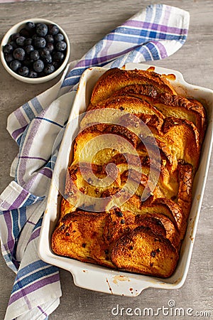 Leftovers bread pudding with blueberries, homemade comfort dessert Stock Photo