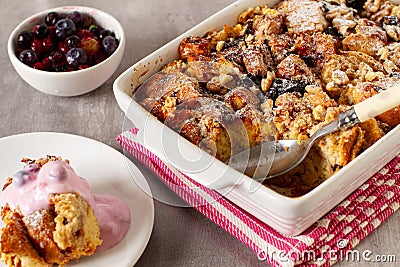 Leftovers bread pudding with nuts and berries Stock Photo