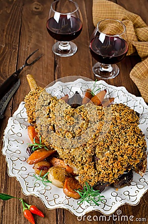 Leg of lamb baked with spicy bread crust Stock Photo