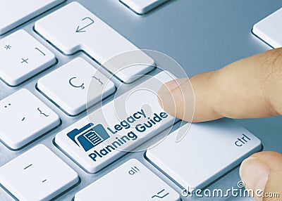 Legacy planning guide - inscription on blue keyboard key Stock Photo