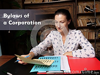 Legal concept about Bylaws of a Corporation . Closeup portrait of unrecognizable successful Businesswoman wearing formal suit Stock Photo