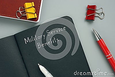 Legal concept about Military Service Benefits with inscription on the piece of paper Stock Photo