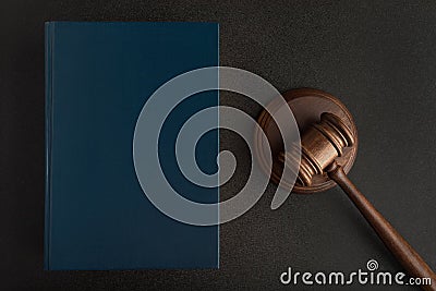 Legal judge hammer or mallet and Law books on black background. Jurisprudence. Laws and justice Stock Photo