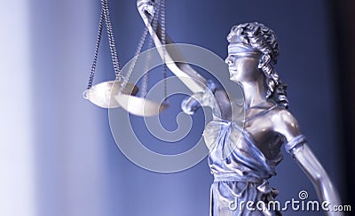 Legal justice statue in law firm office Stock Photo