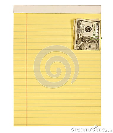 One hundred dollar bill paper clipped to yellow lined paper Stock Photo