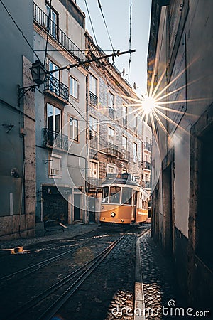 Tram 28 in the old town of Alfama in front of the Cathedral. Mediterranean, Lisbon, Portugal Editorial Stock Photo