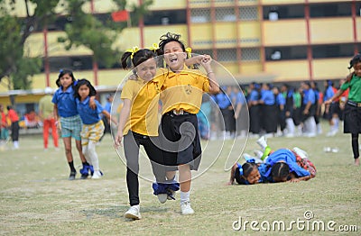 3 legged race, competition, school children competing, participation Editorial Stock Photo