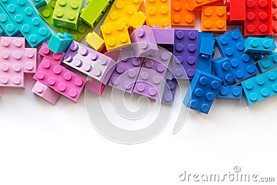 Lego. A lot of Colorful Plastick constructor blocks on white background. Popular toys. Copyspace Stock Photo