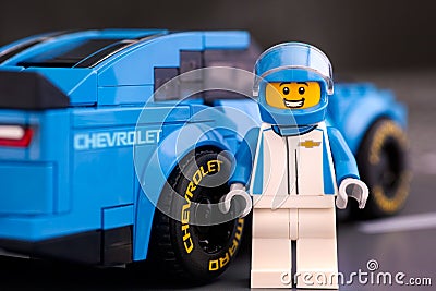 Lego Chevrolet driver near Lego Chevrolet Camaro ZL1 race car Editorial Stock Photo