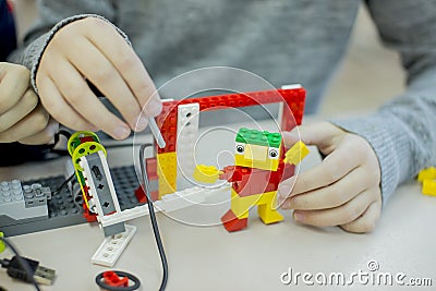 Lego-design circle in high school, children assemble models from the designer Stock Photo