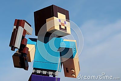 Lego Minecraft large figure of main character Steve with his pickaxe. Editorial Stock Photo