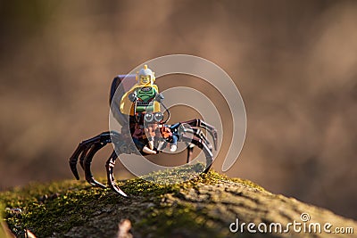 lego minifigure spaceman riding huge spider Editorial Stock Photo
