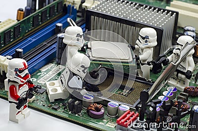 Lego starwars character assembling cpu on motherboard Editorial Stock Photo