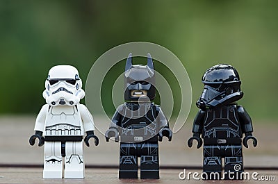 Lego stormtrooper in line one of them wearing batman mask Editorial Stock Photo