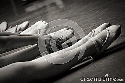 Legs in ballet slippers Stock Photo