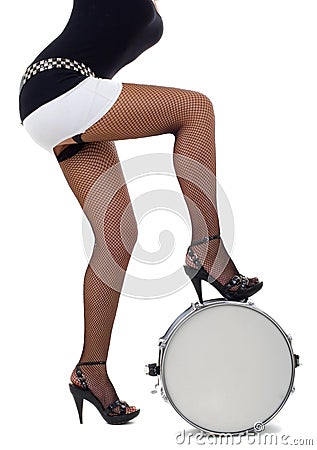 Legs of beautiful brunette and snare drum Stock Photo