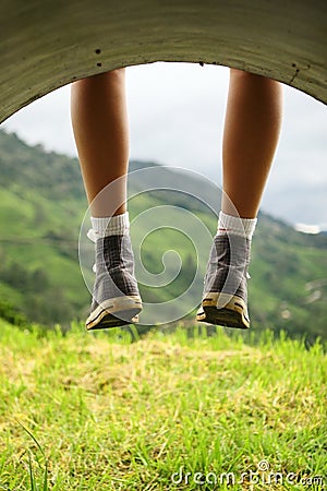 Legs dangling Stock Photo