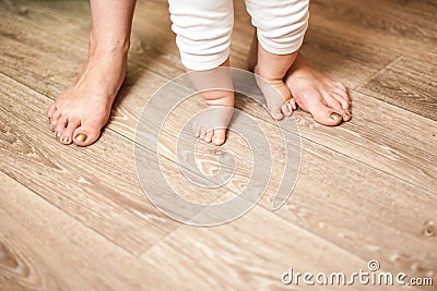 Legs happy family mother and baby Stock Photo