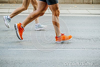 legs runners man and woman run Stock Photo