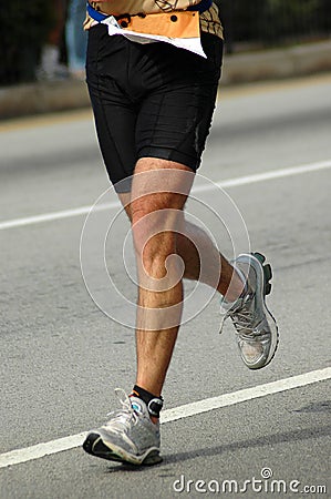 Legs running Stock Photo