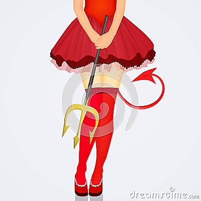 Legs of woman with devil costume and pitchfork Stock Photo