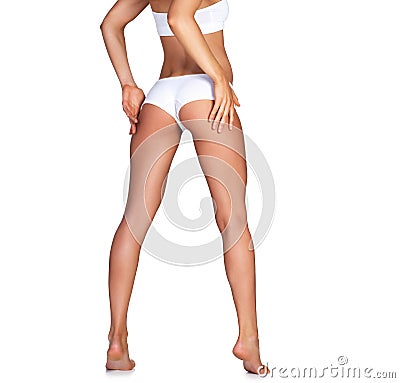 With those legs, you better get ready to swoon. Studio shot of an unrecognizable young woman in her underwear posing Stock Photo