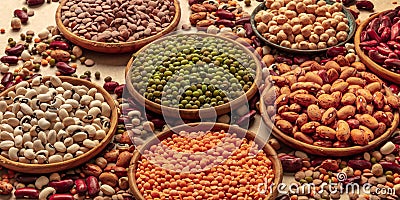 Legumes assortment on a brown background. Lentils, soybeans, chickpeas, red kidney beans Stock Photo