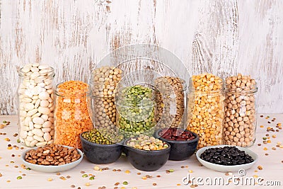 Legumes, lentils, chickpeas and beans assortment in jars Stock Photo