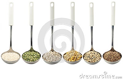 Legumes over spoons Stock Photo