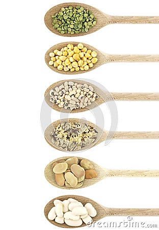 Legumes over spoons Stock Photo