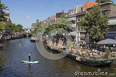 Boat terrace on the canal at the Nieuwe Rijn in Leiden Editorial Stock Photo