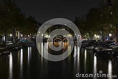 Leidsegracht bridge over Keizersgracht canal at night Editorial Stock Photo