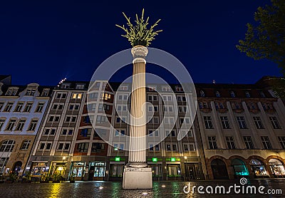 Leipzig, Germany - July 02, 2022: The city Center of the saxony metropolis at night. The Nikolai pillar at the Nikolai square. Editorial Stock Photo