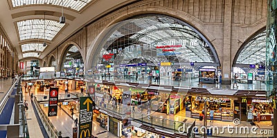 Leipzig main railway station Hauptbahnhof Hbf in Germany Deutsche Bahn DB hall shops panoramic view Editorial Stock Photo