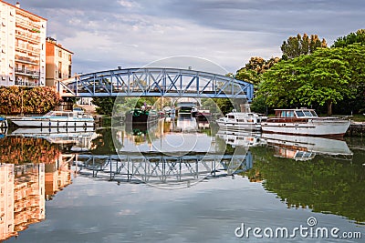 Leisure boats moored on a canal Stock Photo