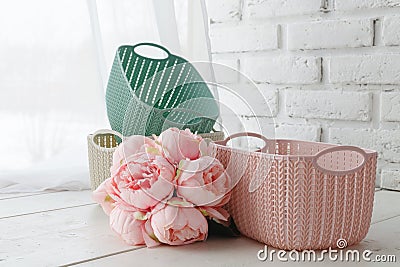Leisure concept, home organizers colored baskets with handmade a Stock Photo