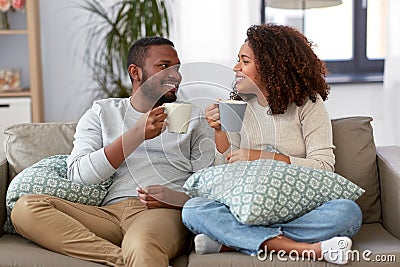 African american couple drinking coffee at home Stock Photo